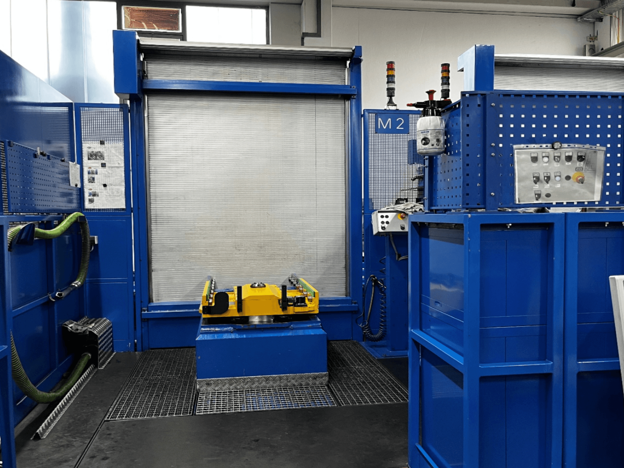BW MCX750 M2 Horizontal Machining Centre front view, featuring blue panels, a yellow worktable, and control unit.