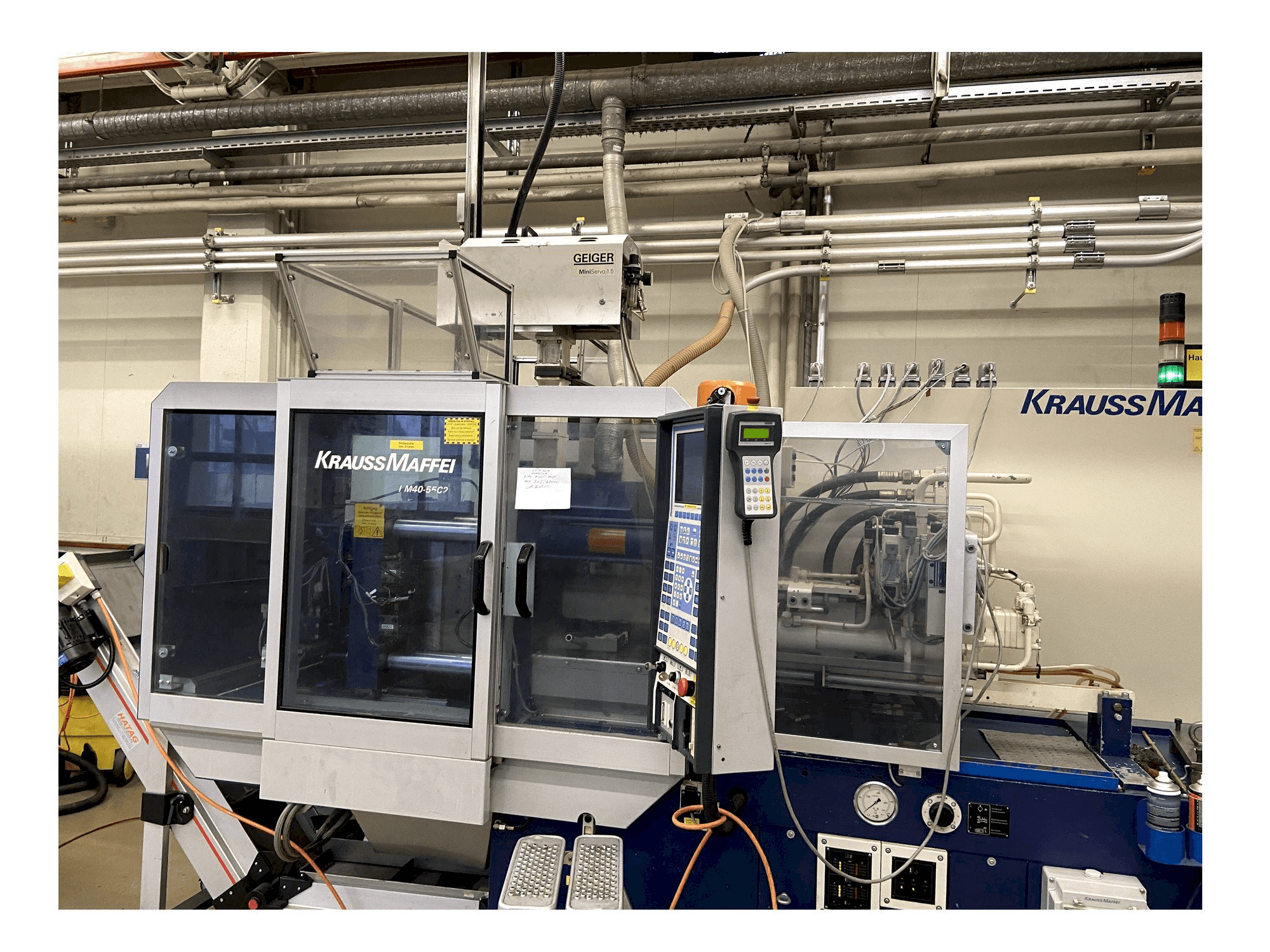 Front view of Krauss Maffei 40-55 C2 machine