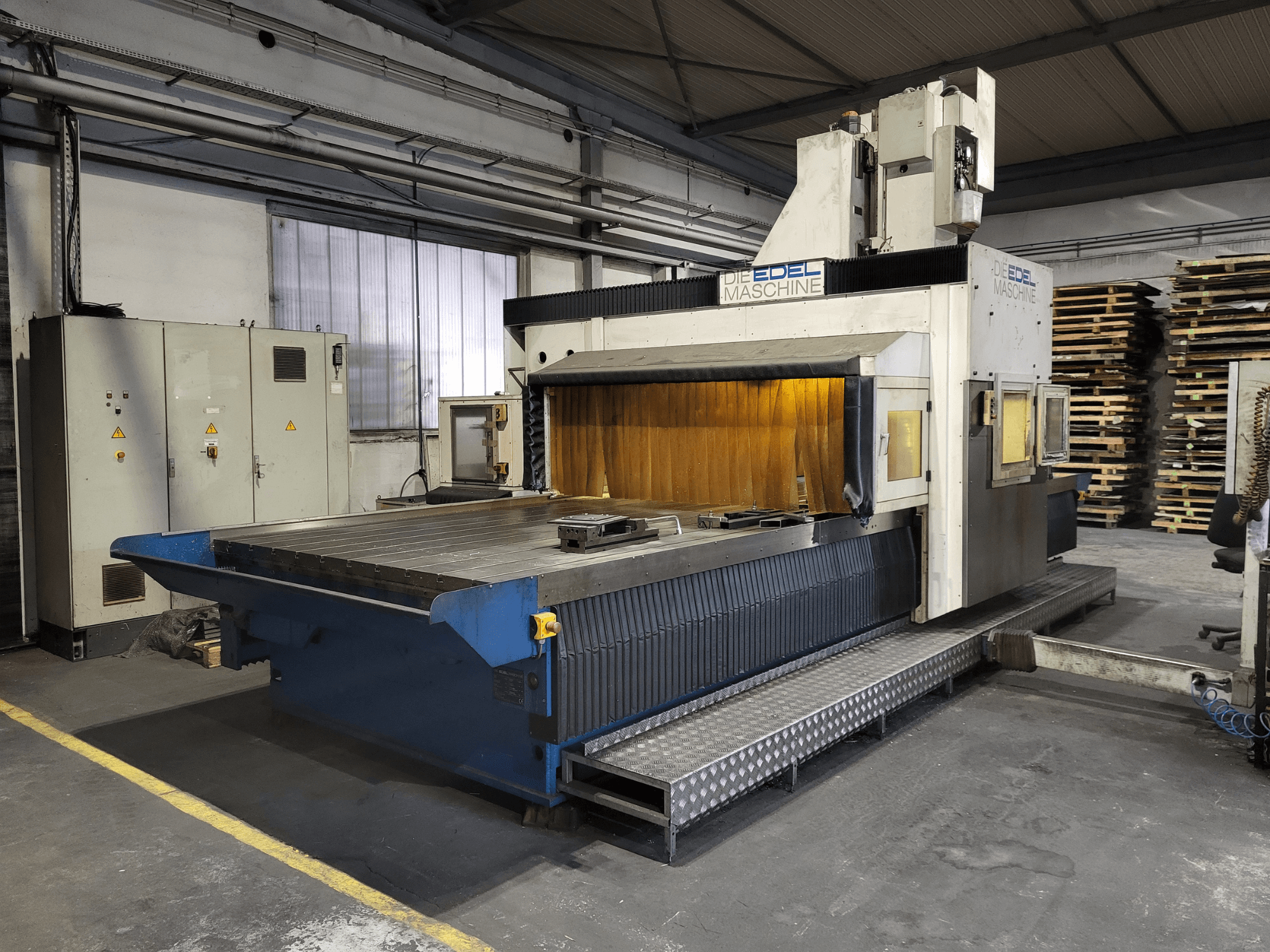 Gantry Milling Machine EDEL Koordimatic XL 4020, front view, showing large worktable and control unit in industrial setting.