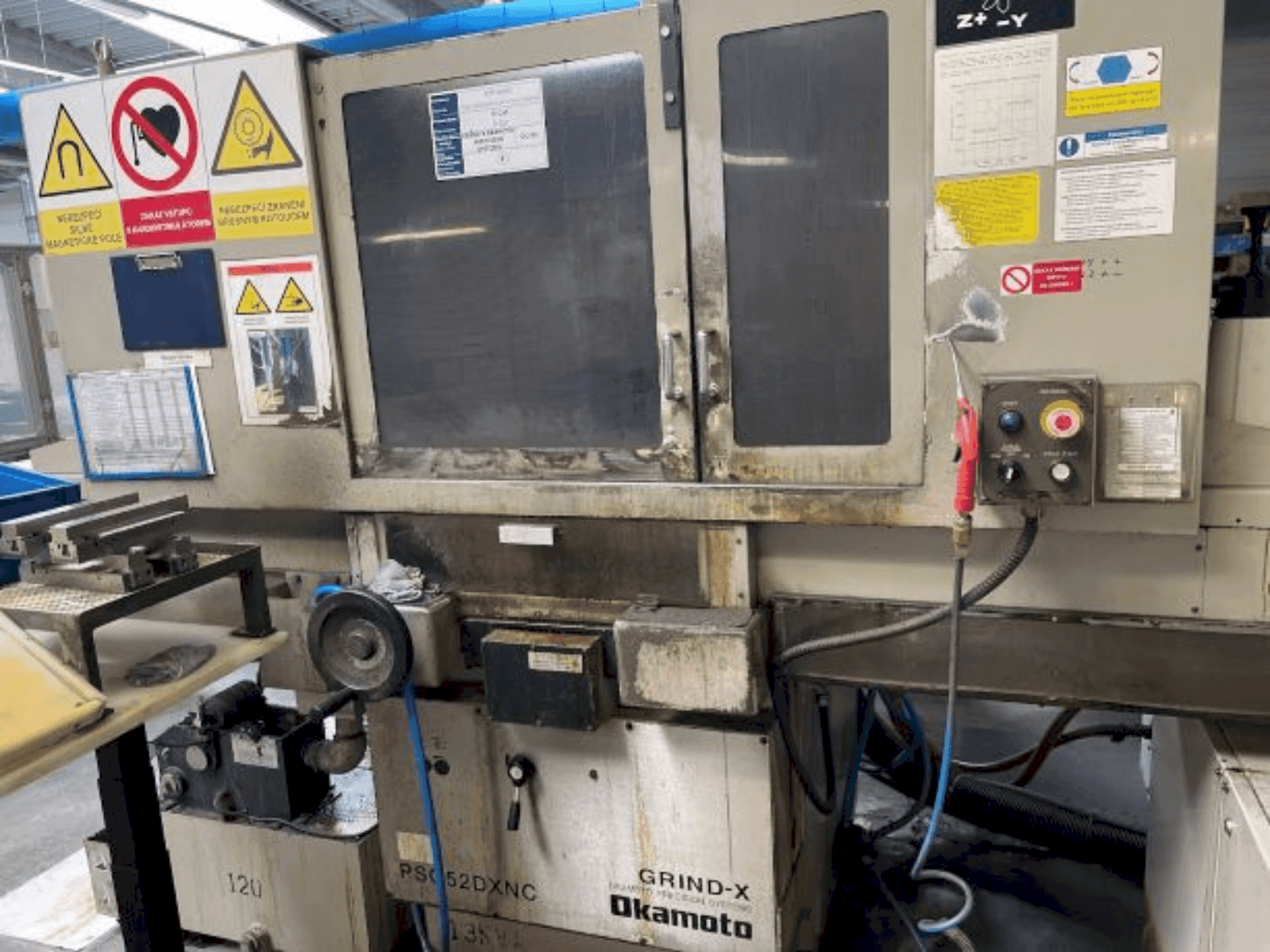 Front view of OKAMOTO PSG-52DXNC machine