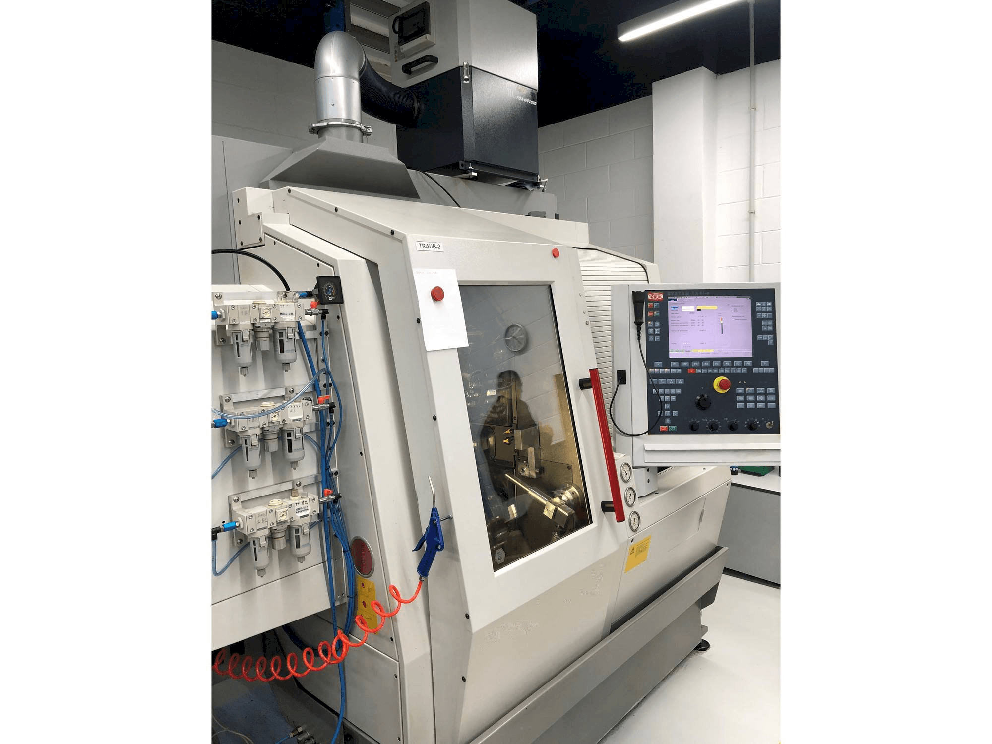 Left side view of TRAUB TNL 18 machine