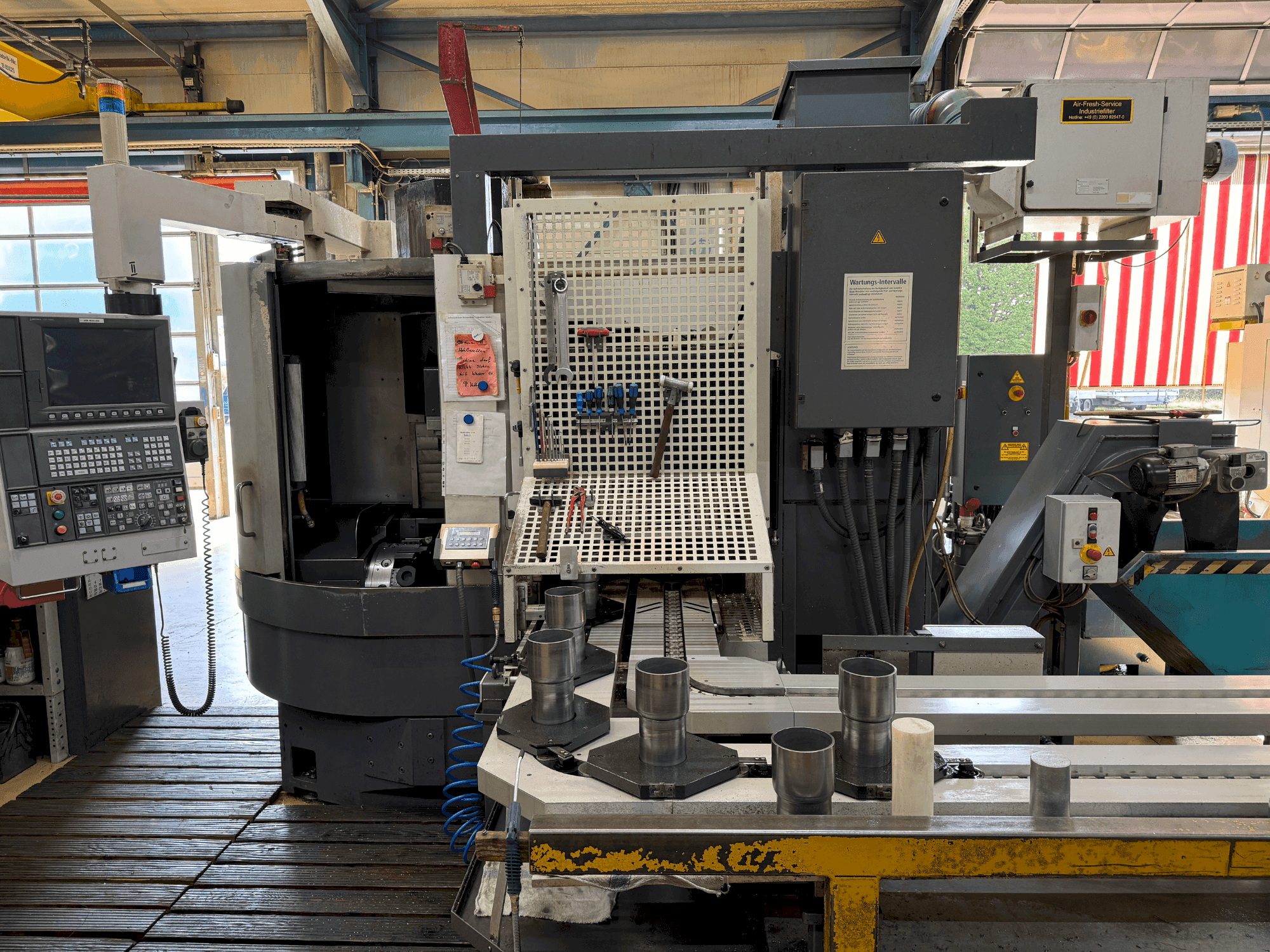 Front view of Okuma LVT 300-M machine