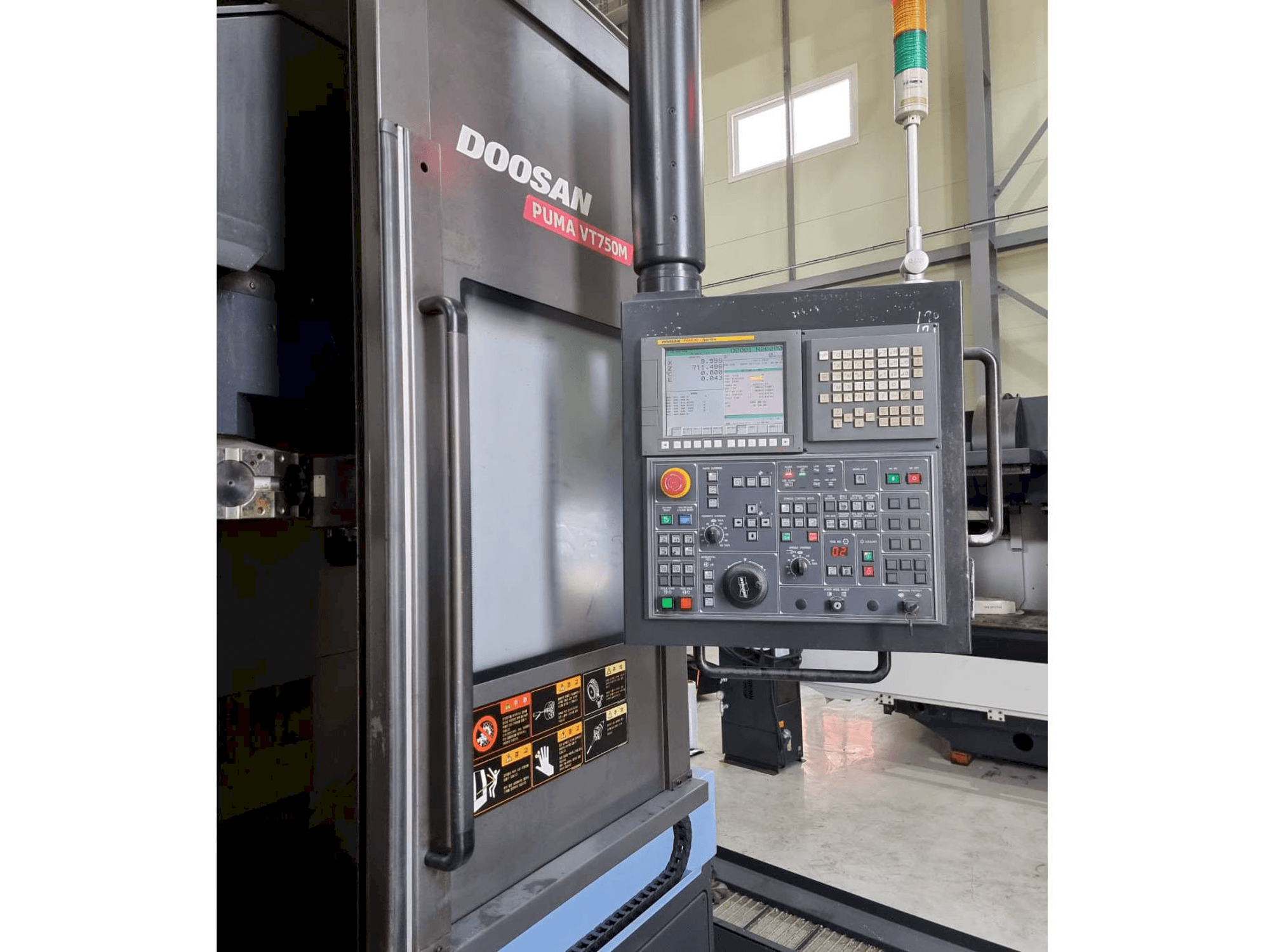 Left side view of Doosan Puma VT750M machine