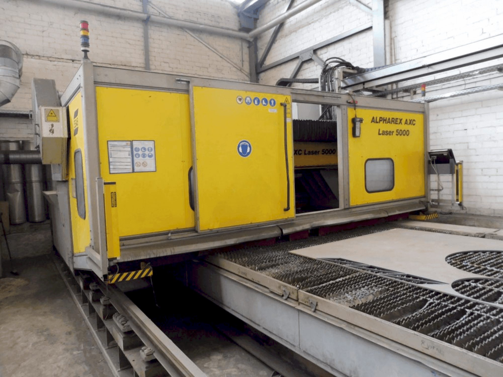 Front view of ALPHAREX AXC Laser 500 machine