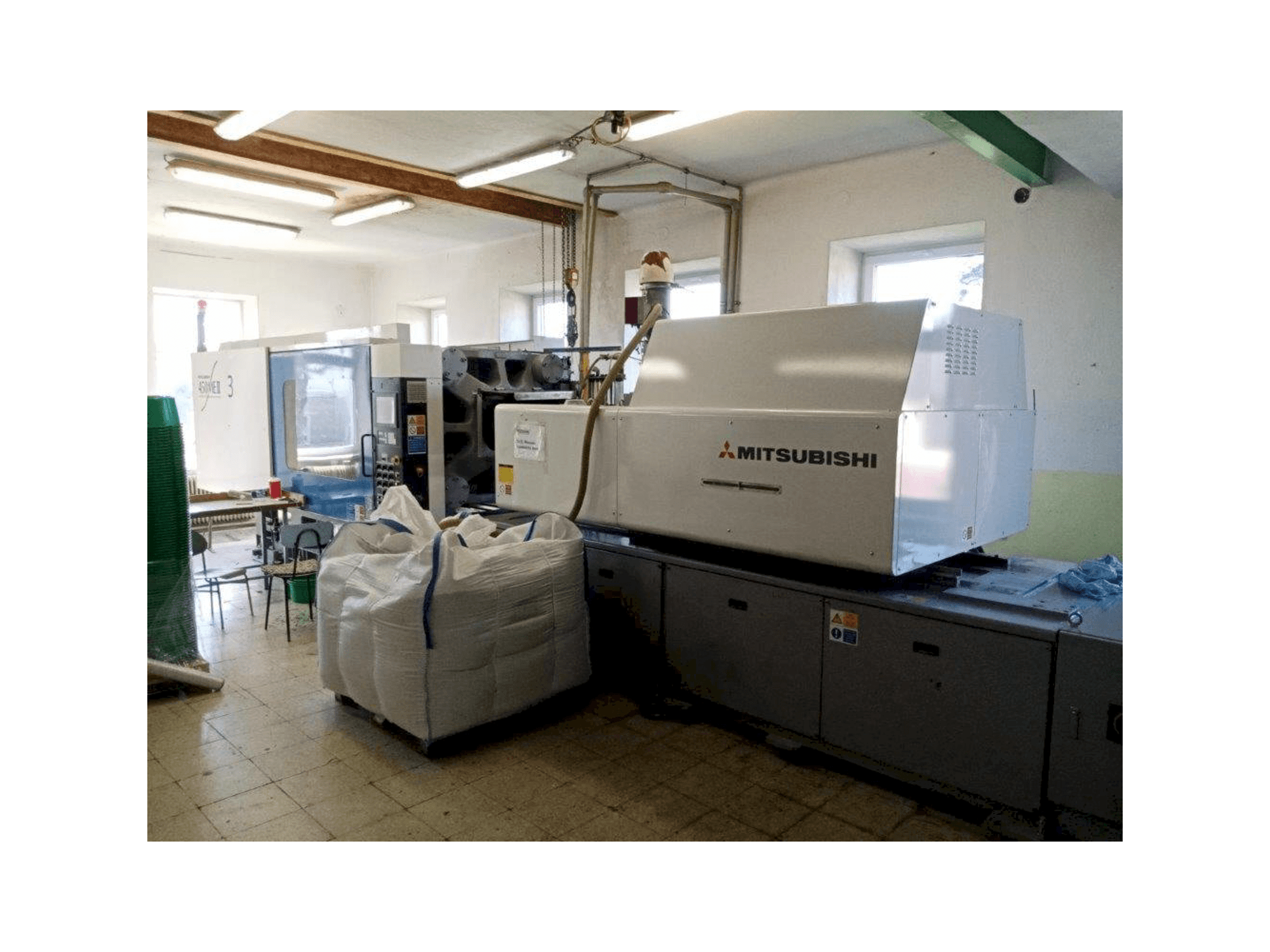 Front view of Mitsubishi 450 ME II-70 machine