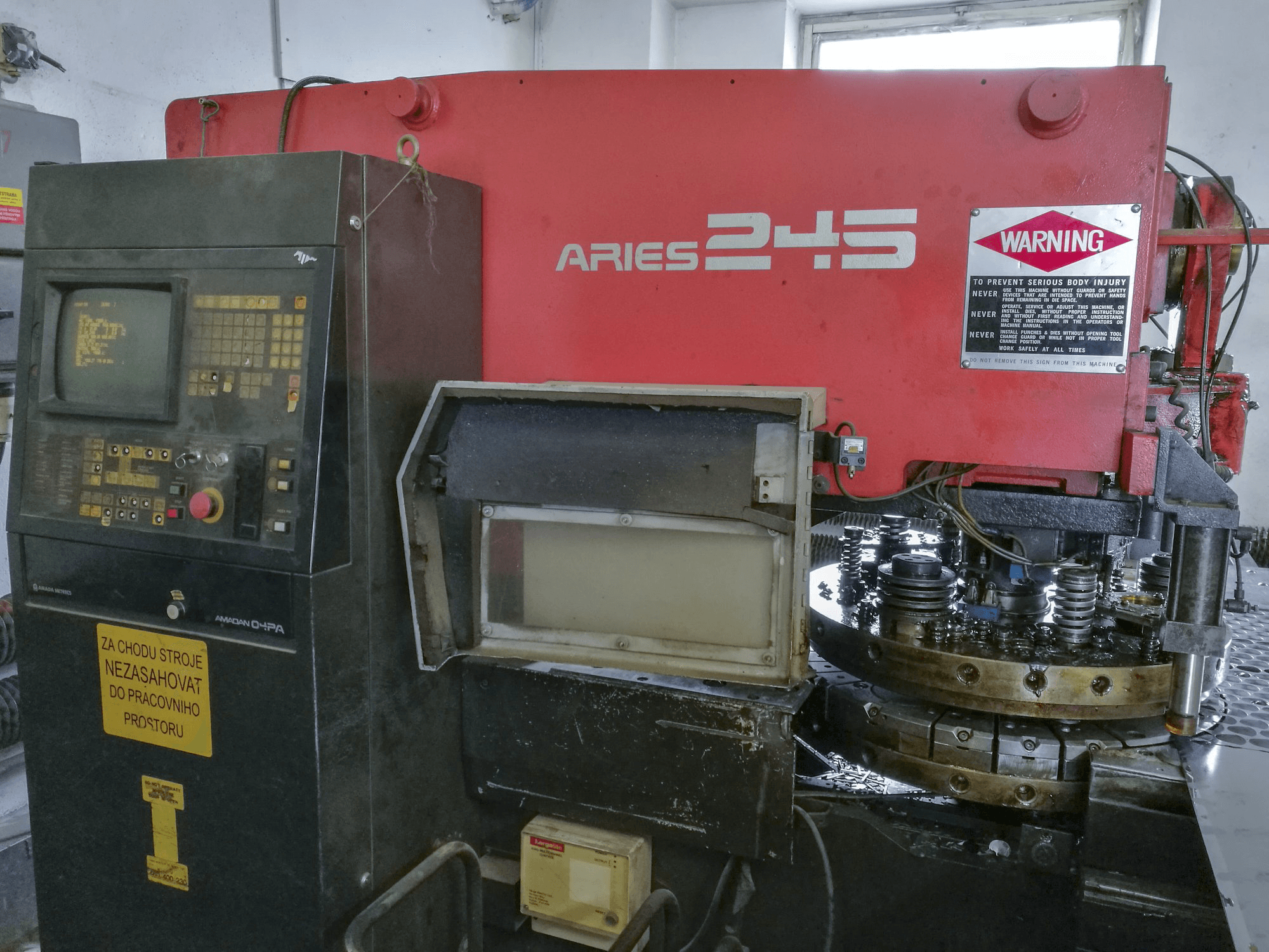 Front view of AMADA ARIES 245 machine