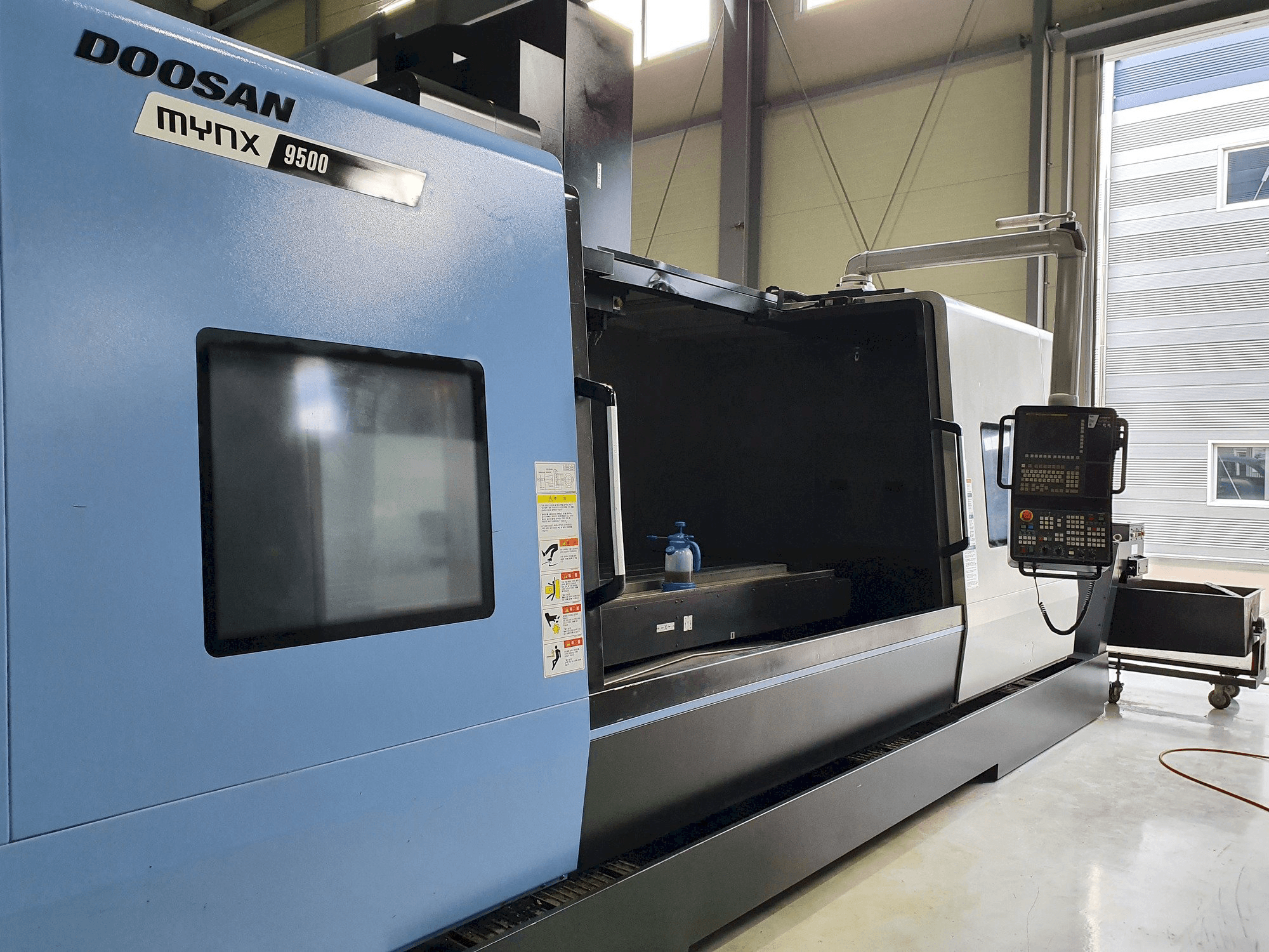 Front view of Doosan MYNX 9500 machine