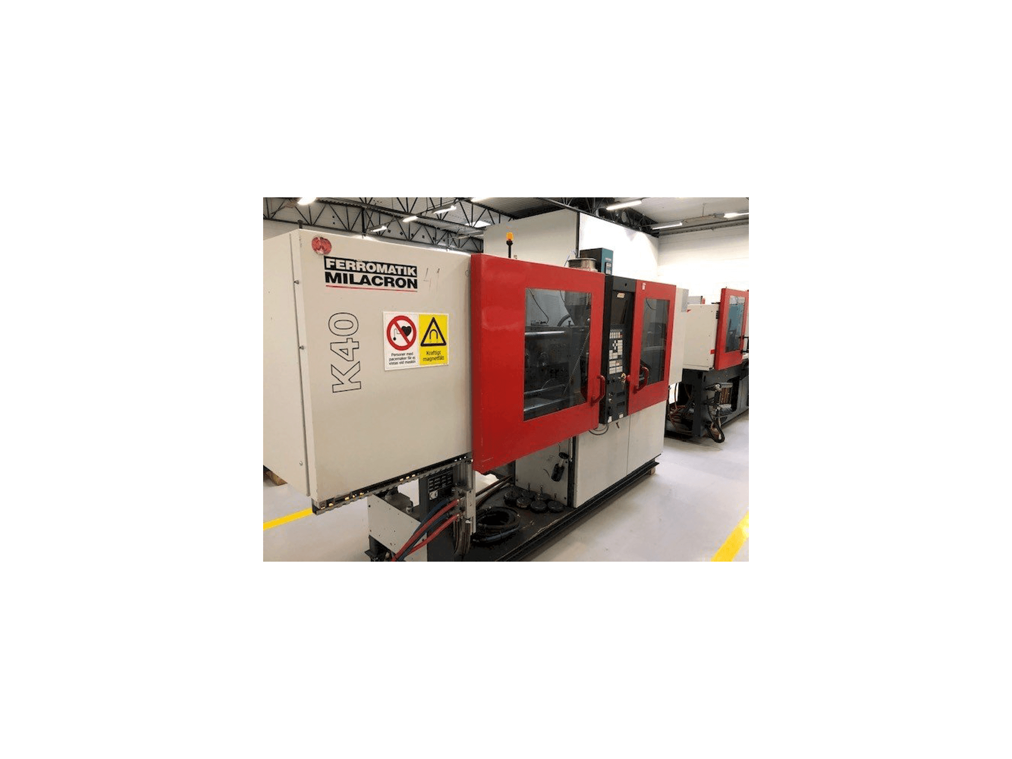 Left side view of FERROMATIK MILACRON K40 D-E machine