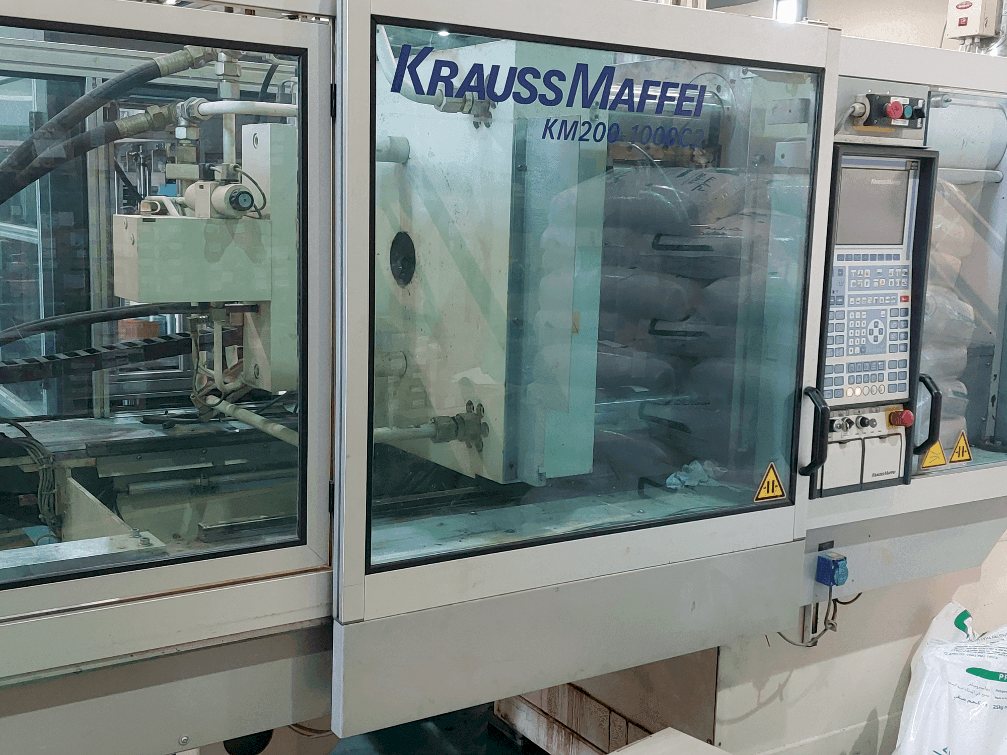 Front view of Krauss Maffei 200-1000 C2 machine