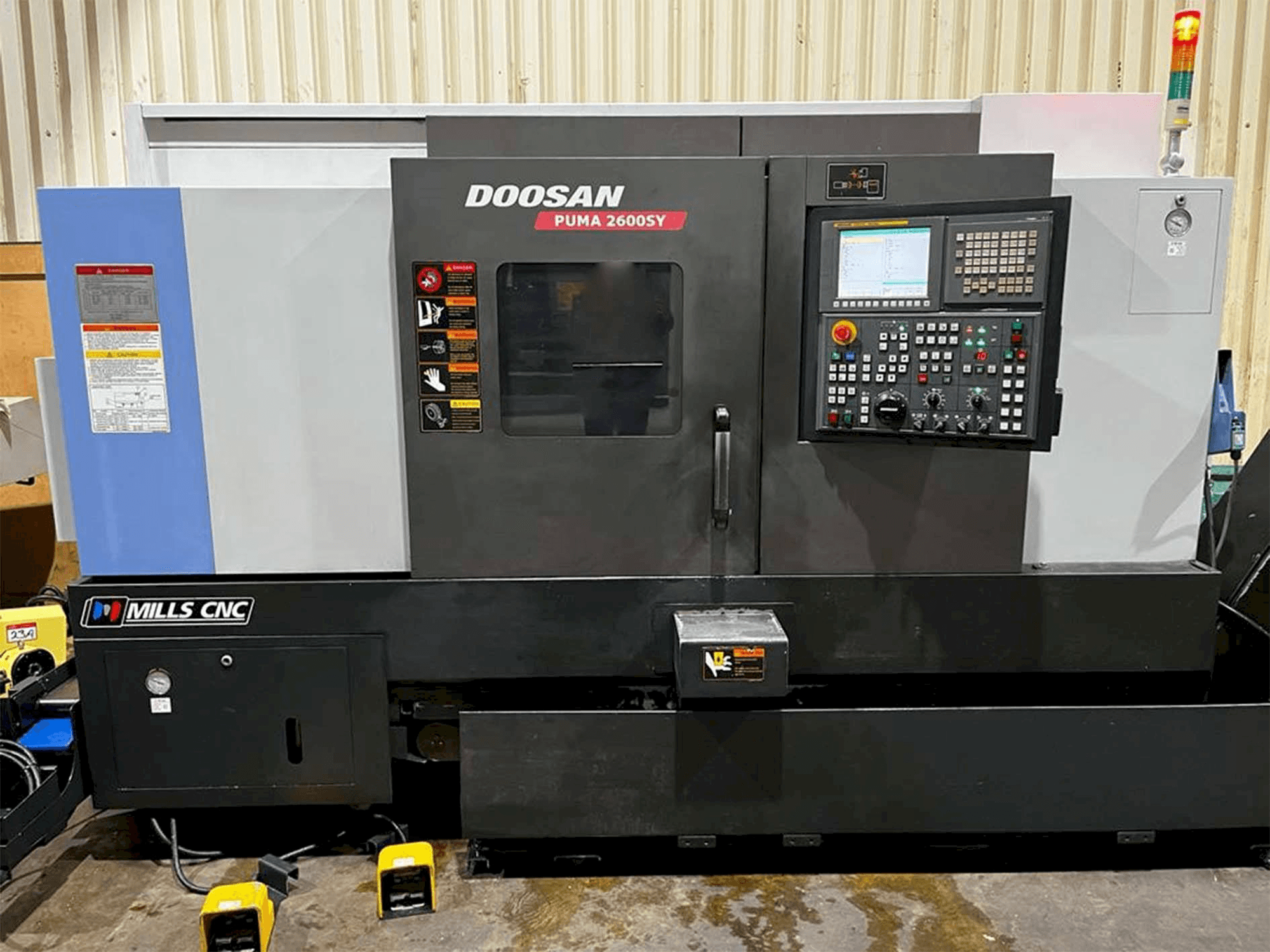 Front view of Doosan Puma 2600SY machine