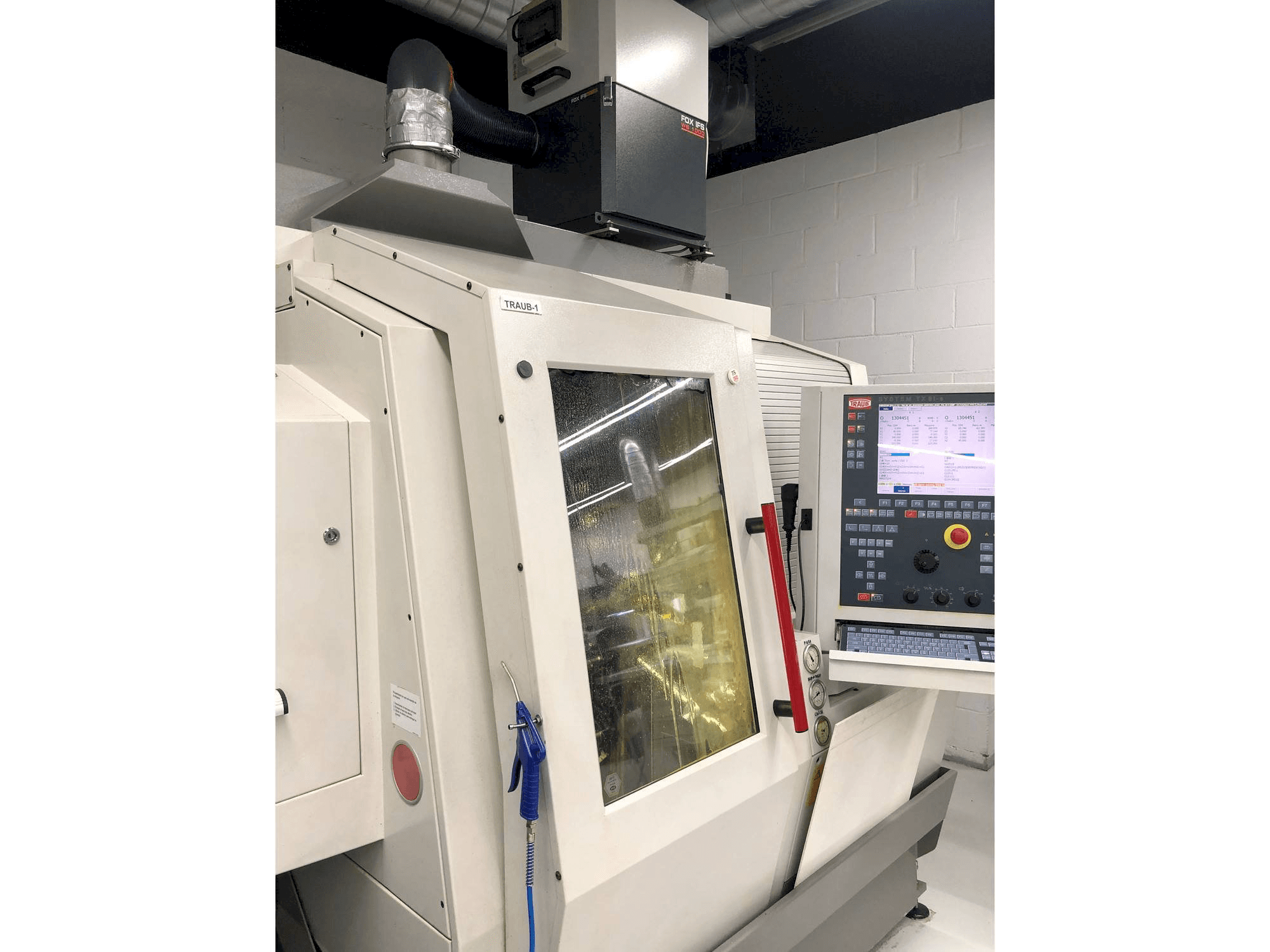 Front view of TRAUB TNL 18 machine