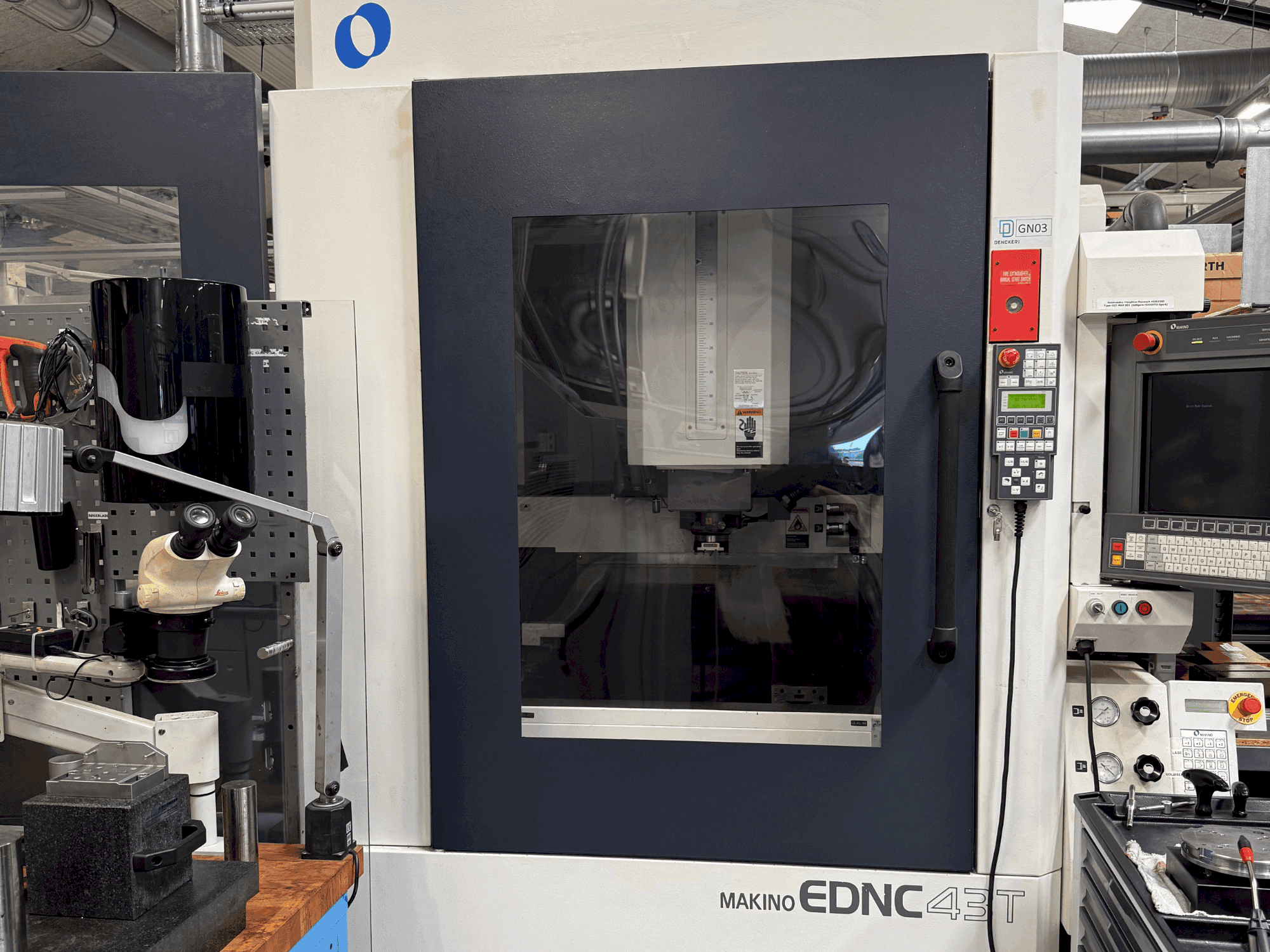 Front view of Makino EDNC 43T incl. Erowa Robot 120 pcs machine
