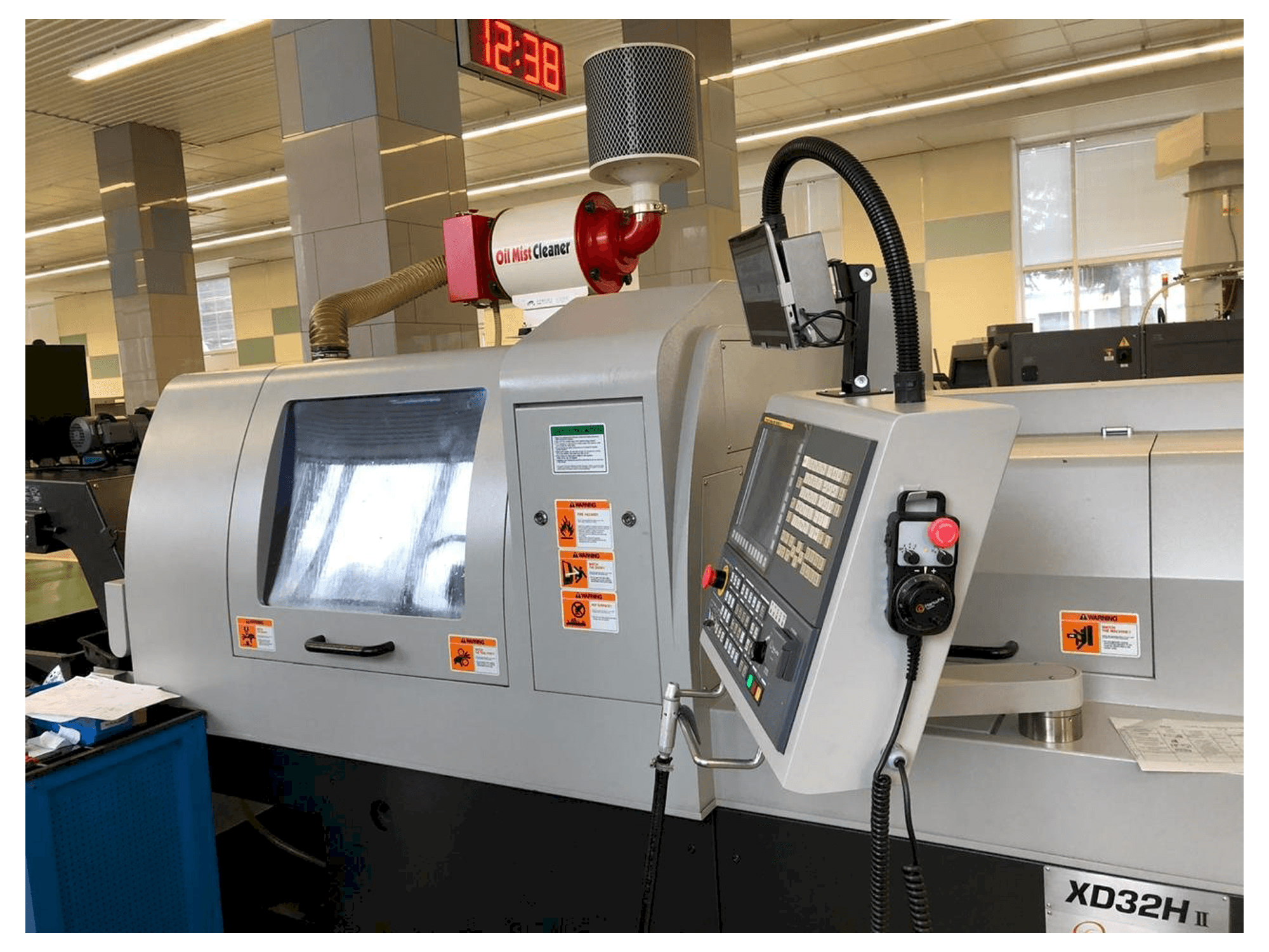 Front view of Hanwha XD32H II machine