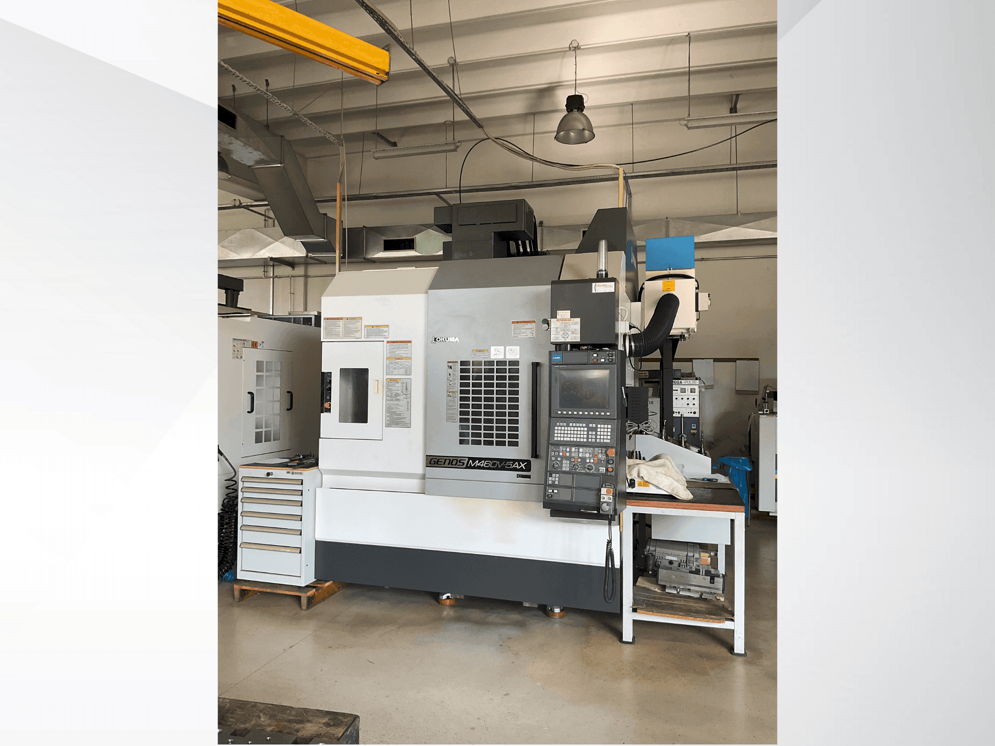 Front view of Okuma GENOS M460V-5AX machine