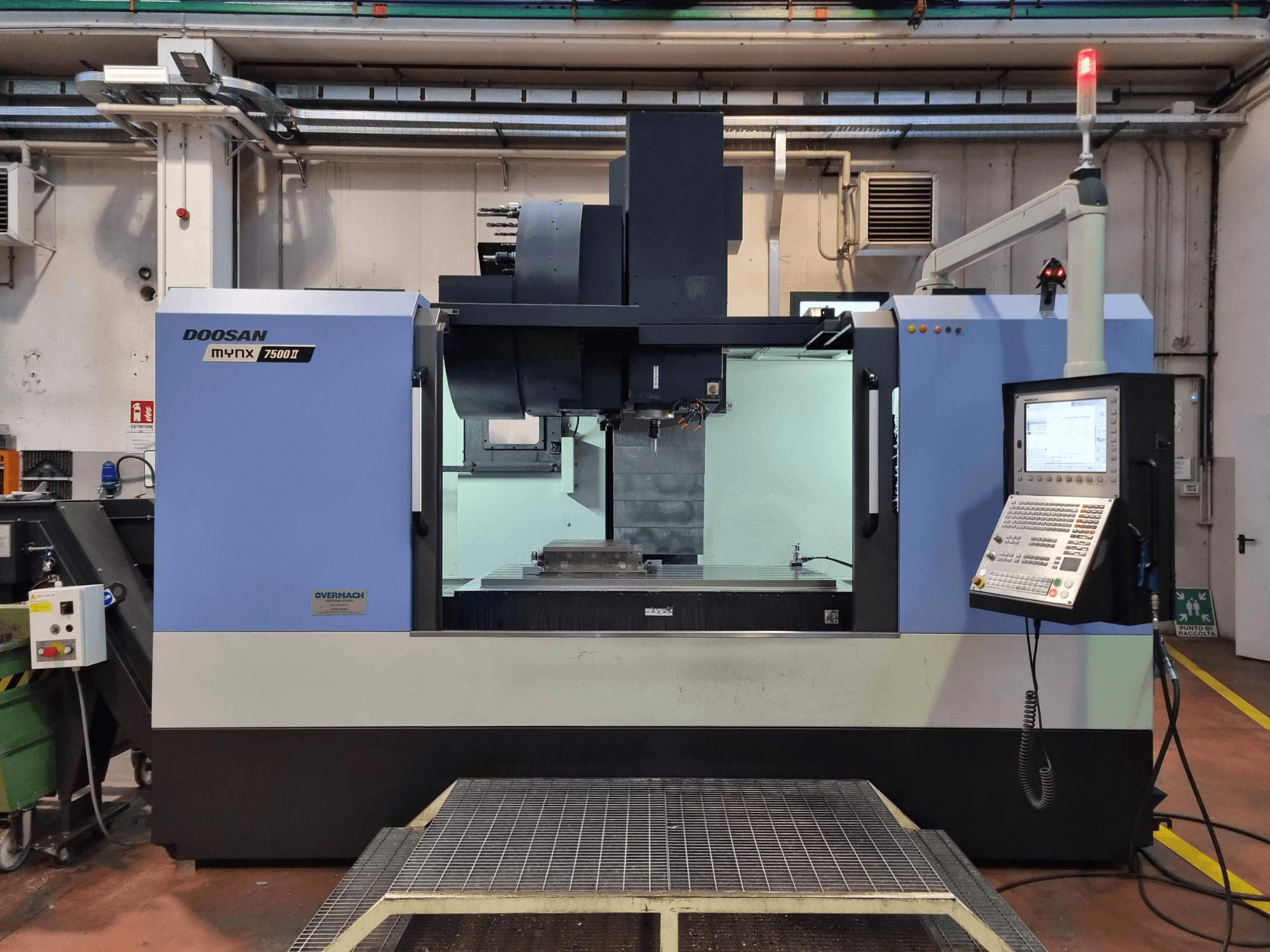 Doosan MYNX 7500i vertical machining center, front view, with control panel and visible workspace for milling operations.