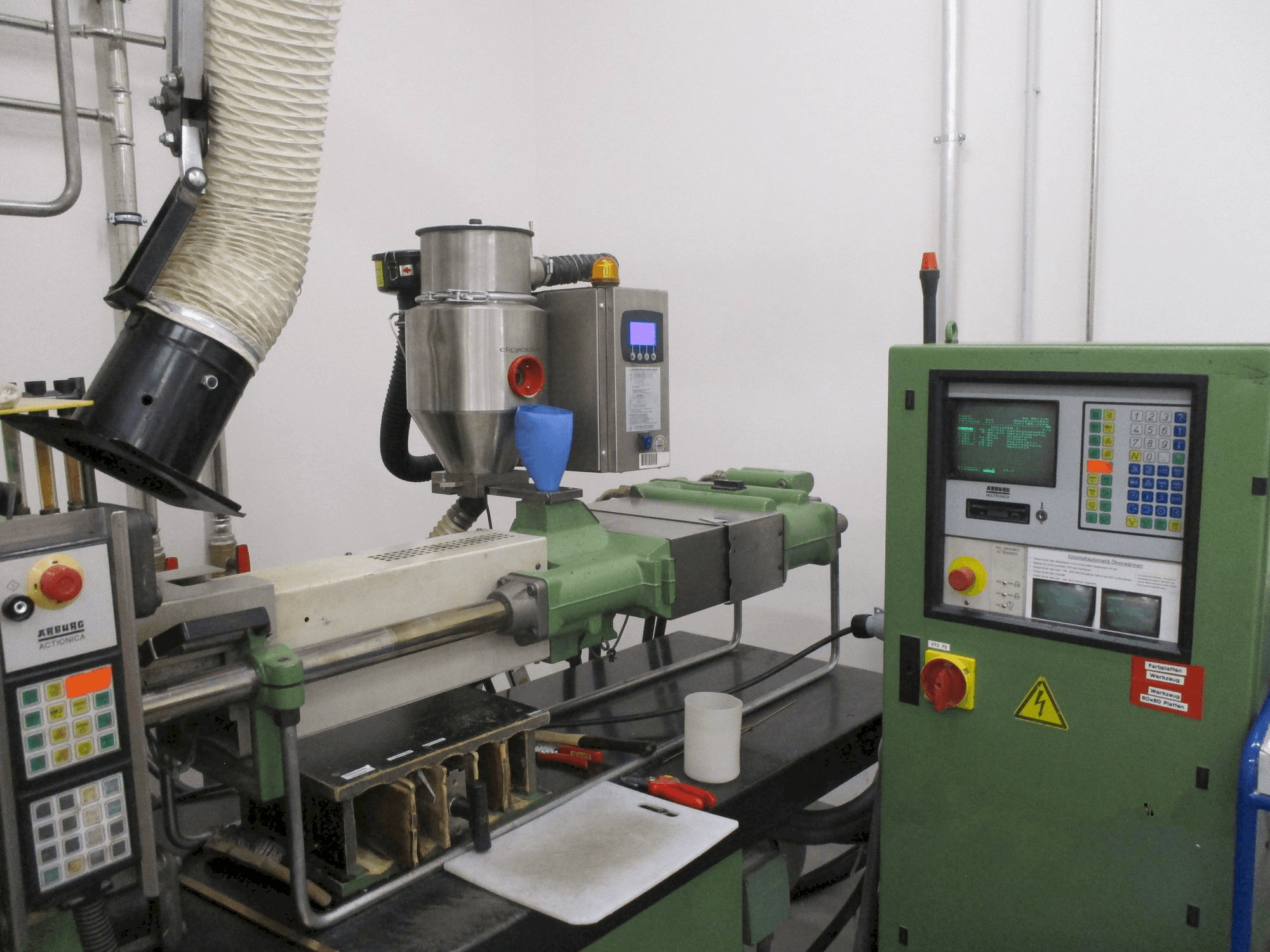 Front view of Arburg Allrounder 320 M 750 - 90/90 2K machine