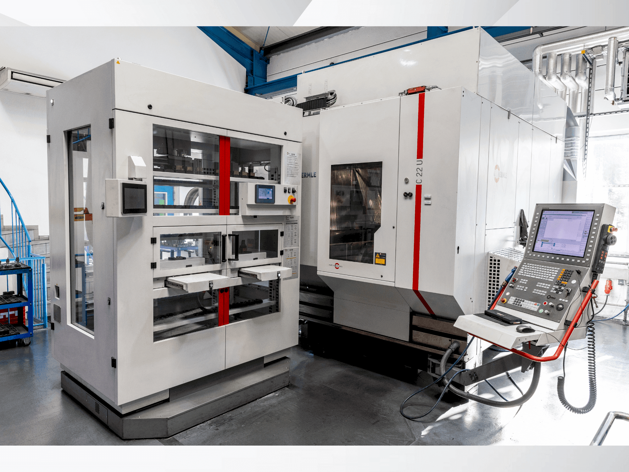 Front view of HERMLE C22 with handling system IH30 machine