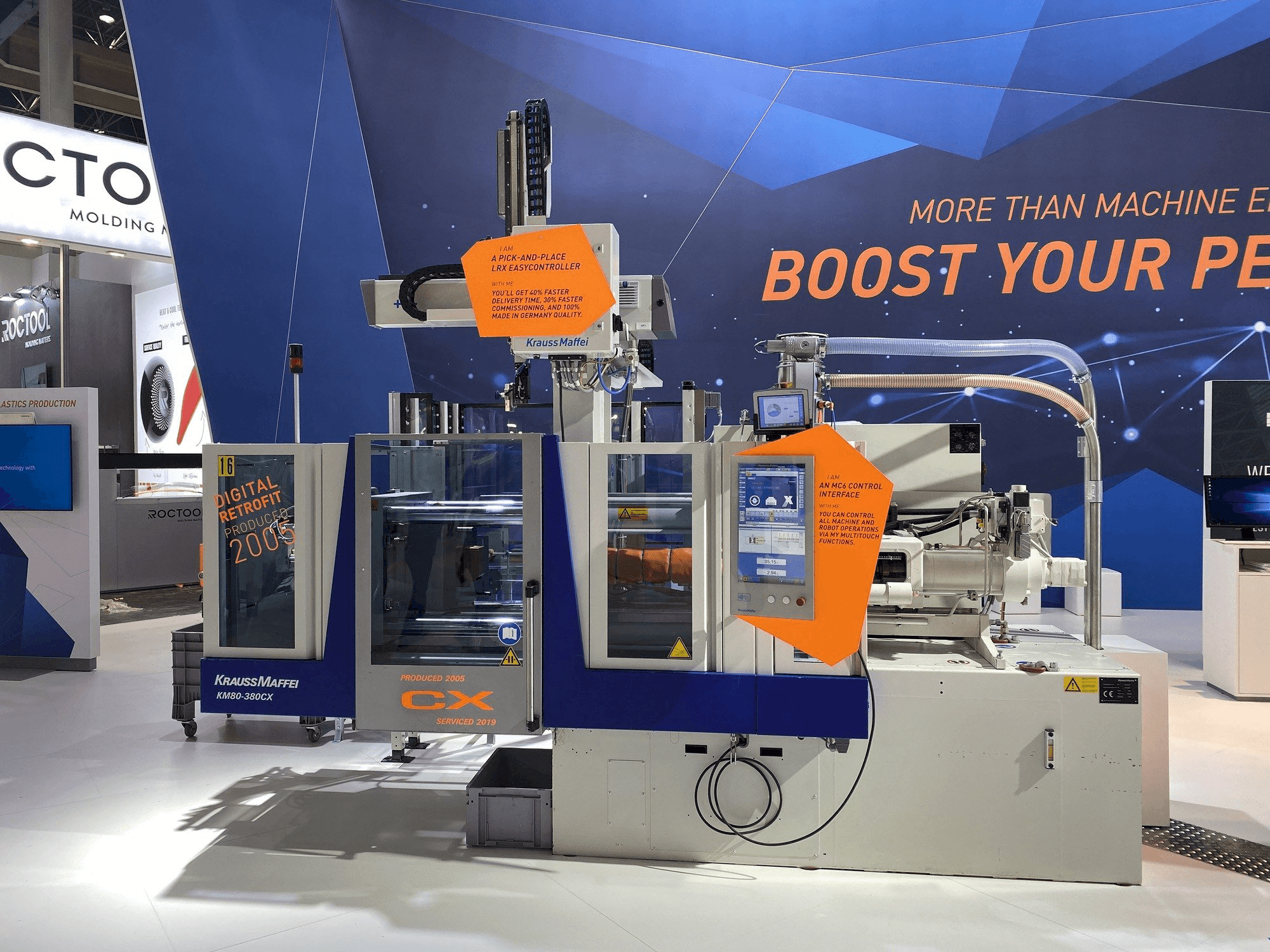 Front view of Krauss Maffei 80-380 CX + LRX easyControl 100 machine