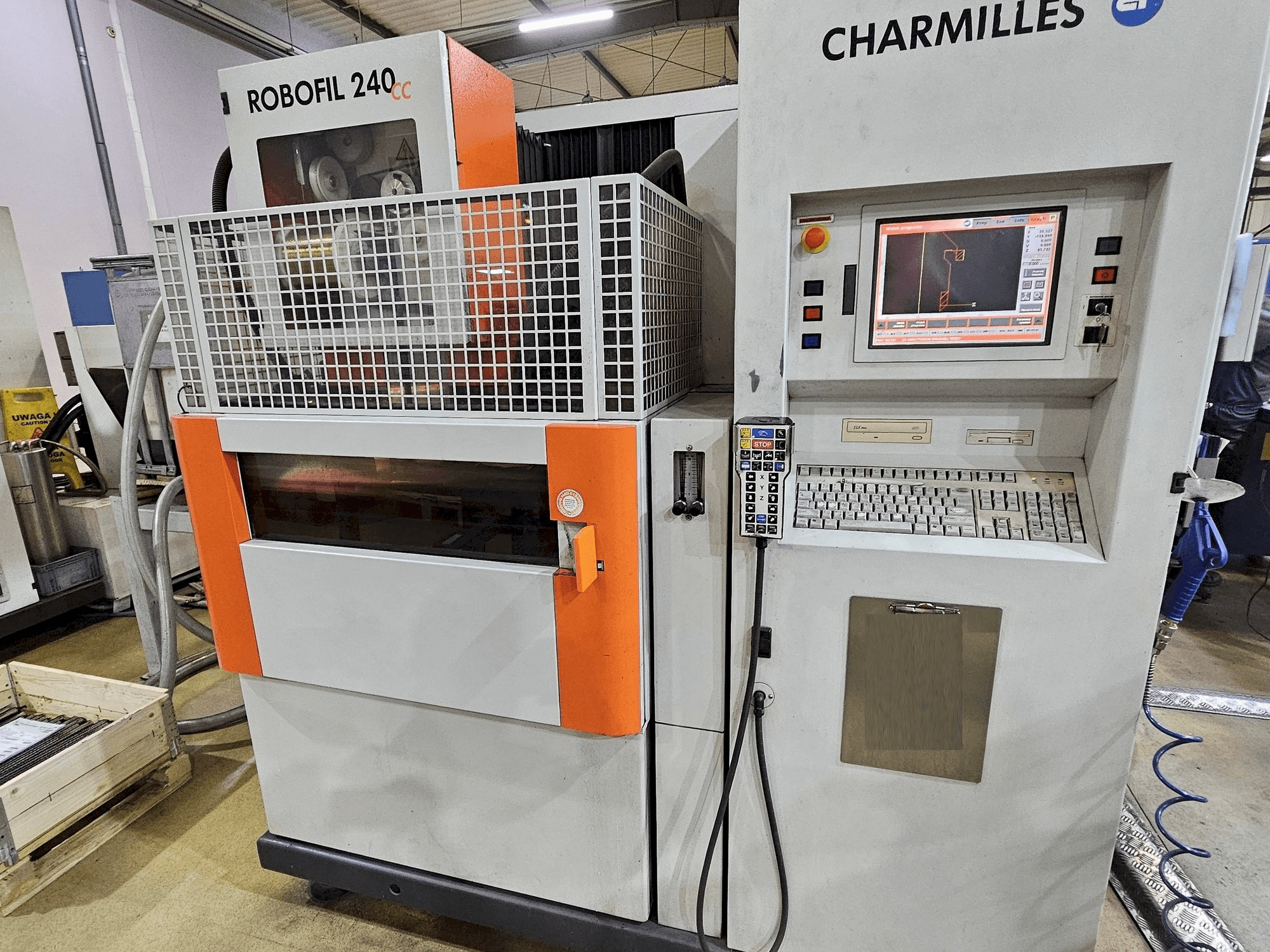 Front view of CHARMILLES ROBOFIL 240 CC machine