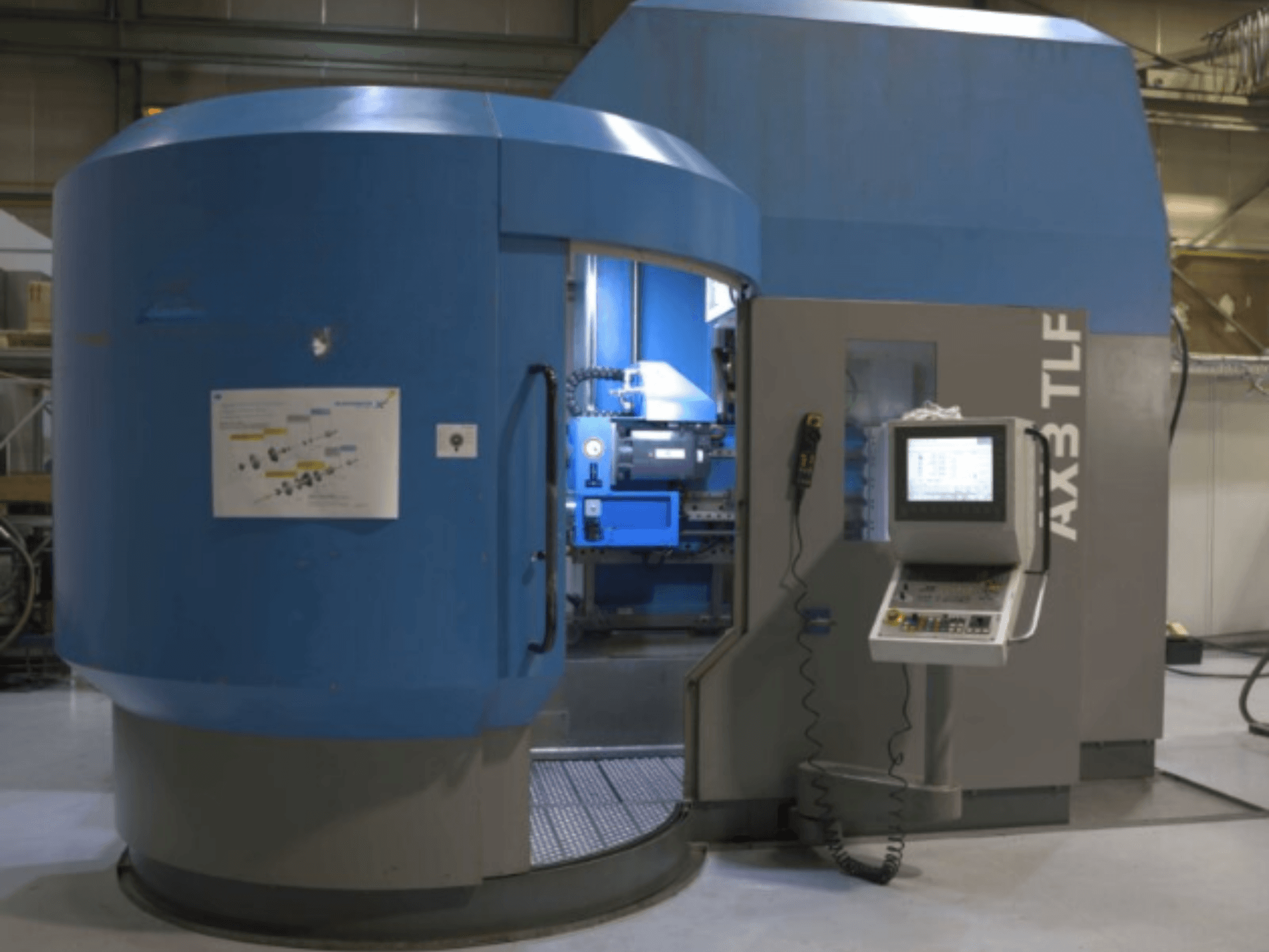 Drilling machine IXION Auerbach IA2 TLF-1200.4 in front view; features control panel and blue casing.