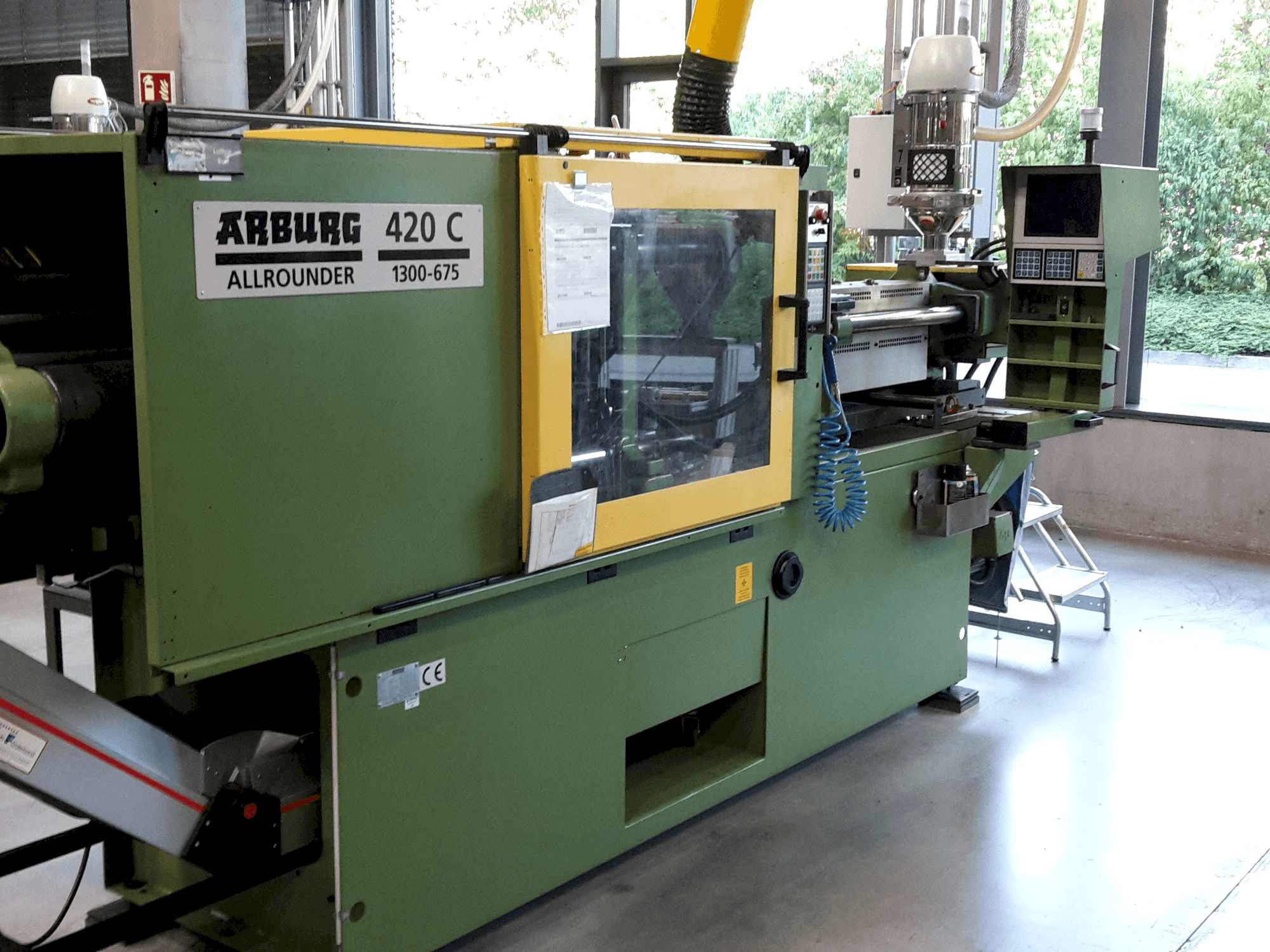 Front view of Arburg Allrounder 420 C 1300 - 675 machine