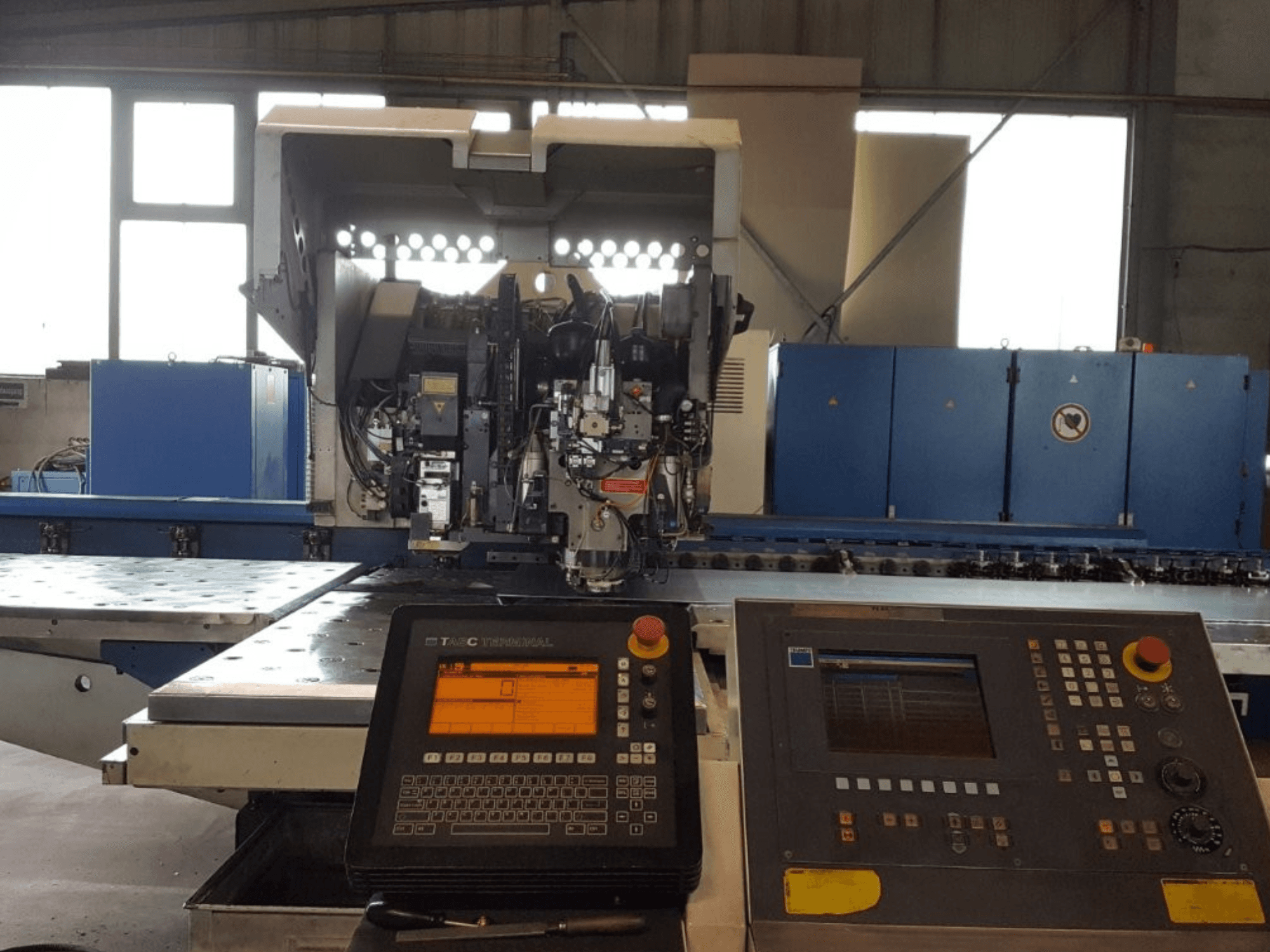 TRUMPF Trumatic 600L Punch-Laser Combo, front view, showcasing control panel and machinery details in a workshop setting.