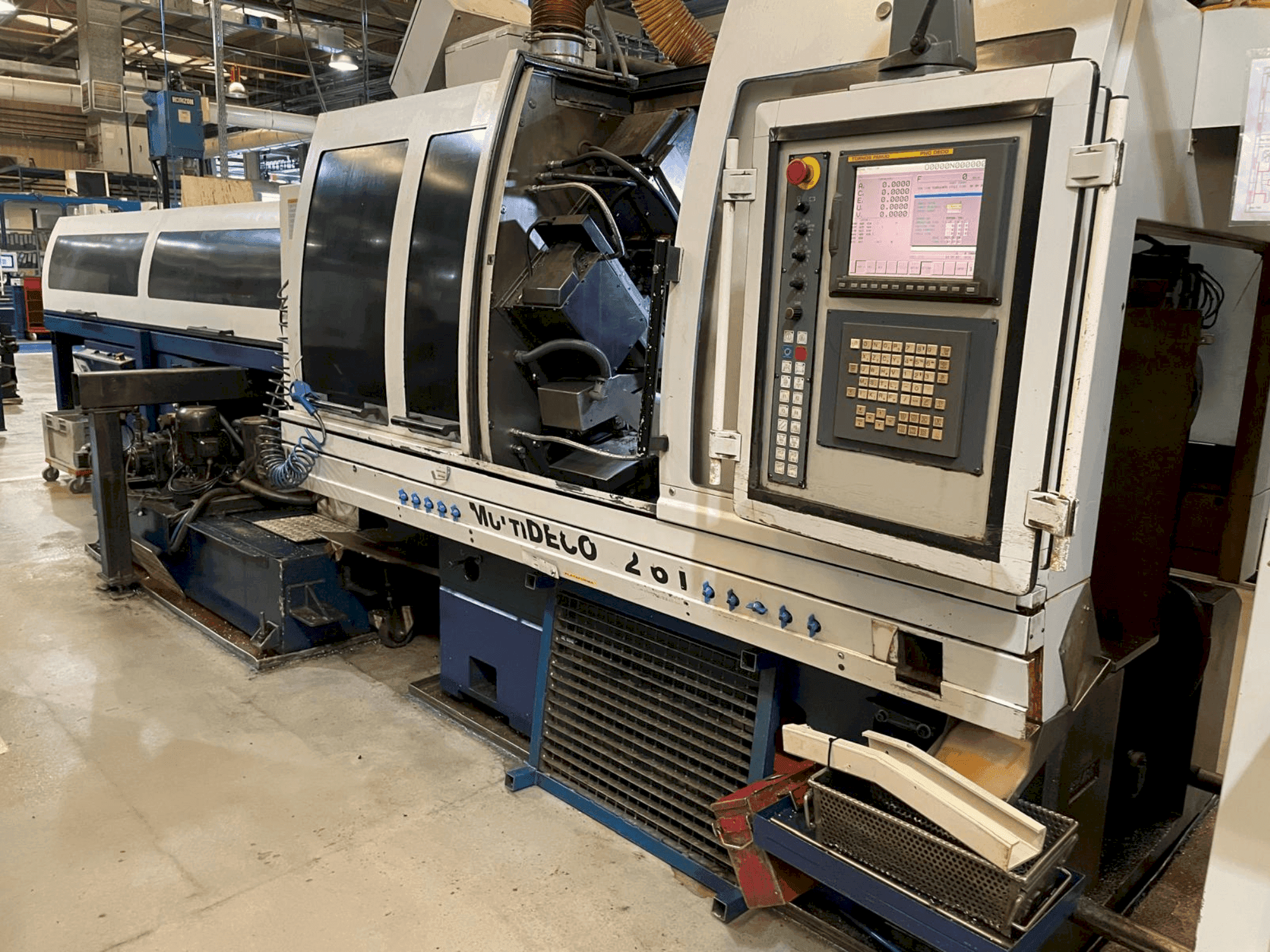 Front view of TORNOS MultiDeco 32-6i machine