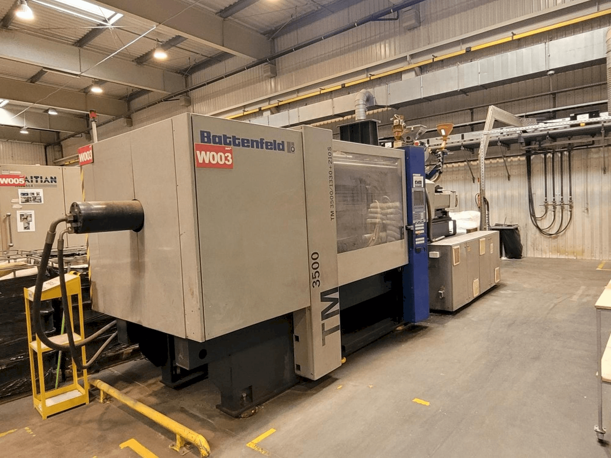 Front view of Battenfeld TM 3500/1330+210S machine