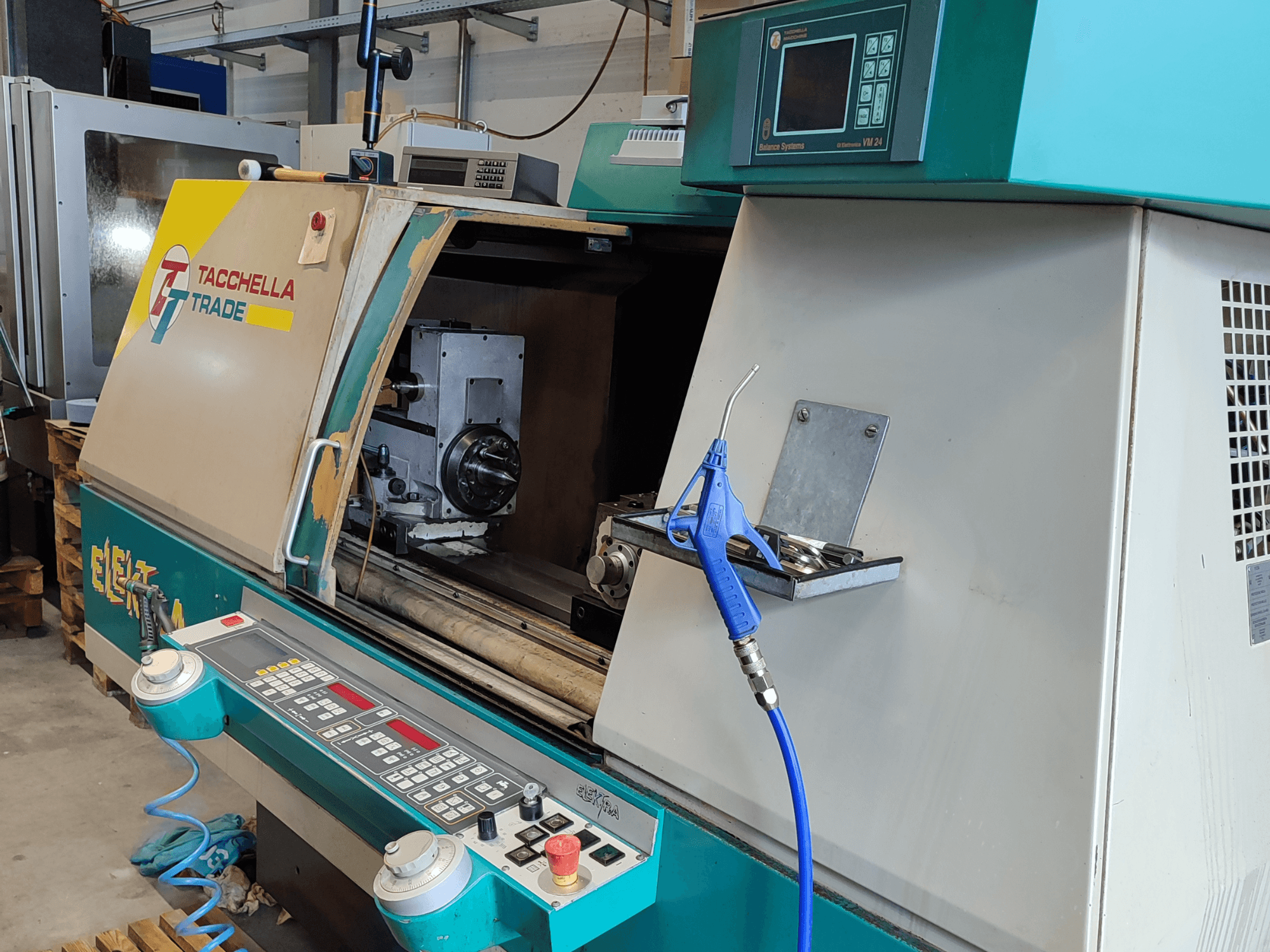 Cylindrical Grinding Machine Tacchella Elektra 513 MPC, front view showcasing control panel and operating area.