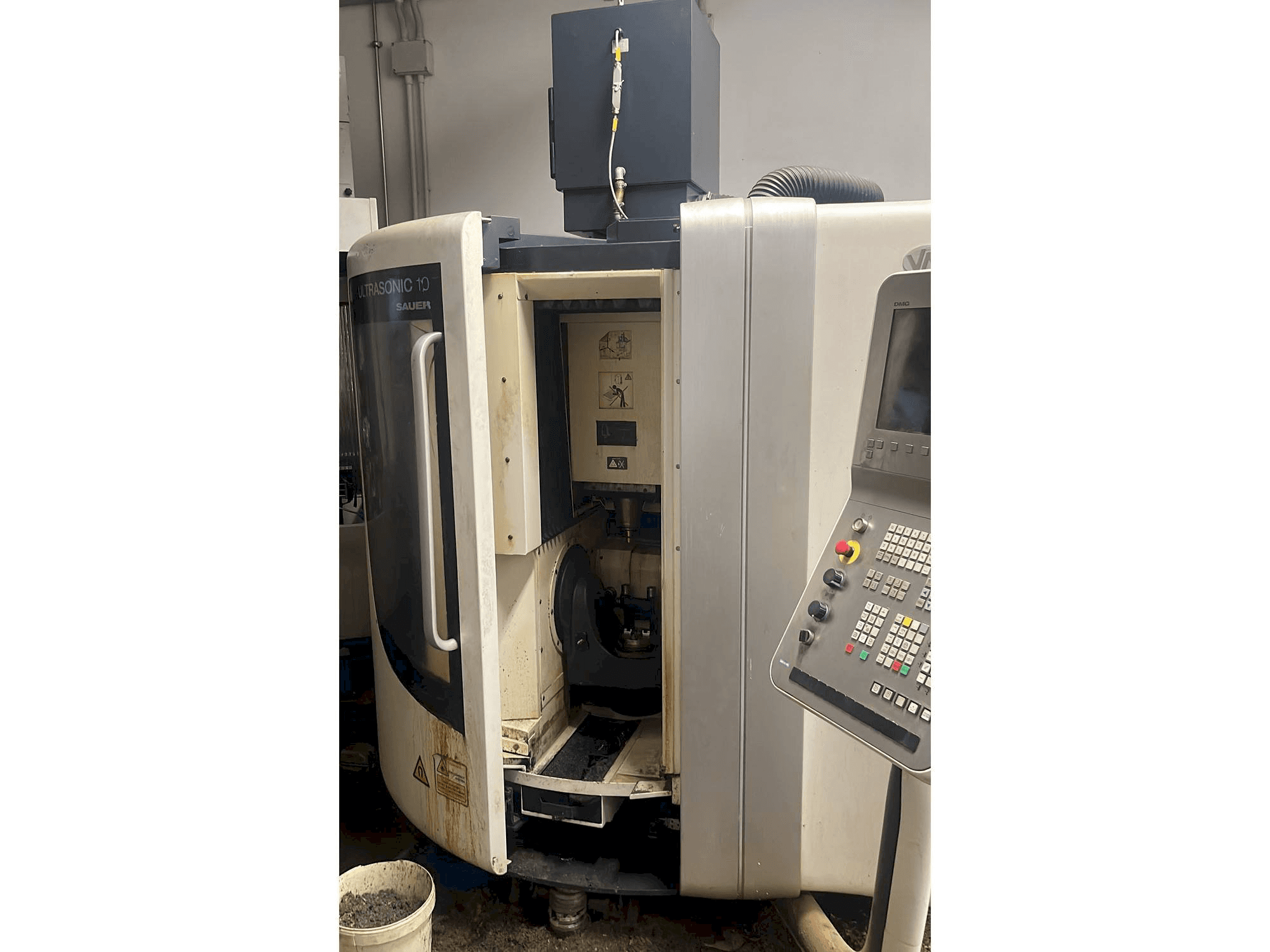 Front view of DMG ultrasonic 10 sauer machine
